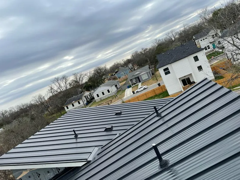 Standing seam metal roof panels with vents for Skylight Repair in Indianola
